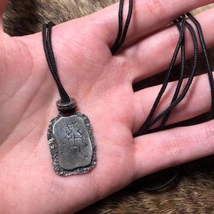 Black chord necklace with pewter Native American style pendant and adjuster